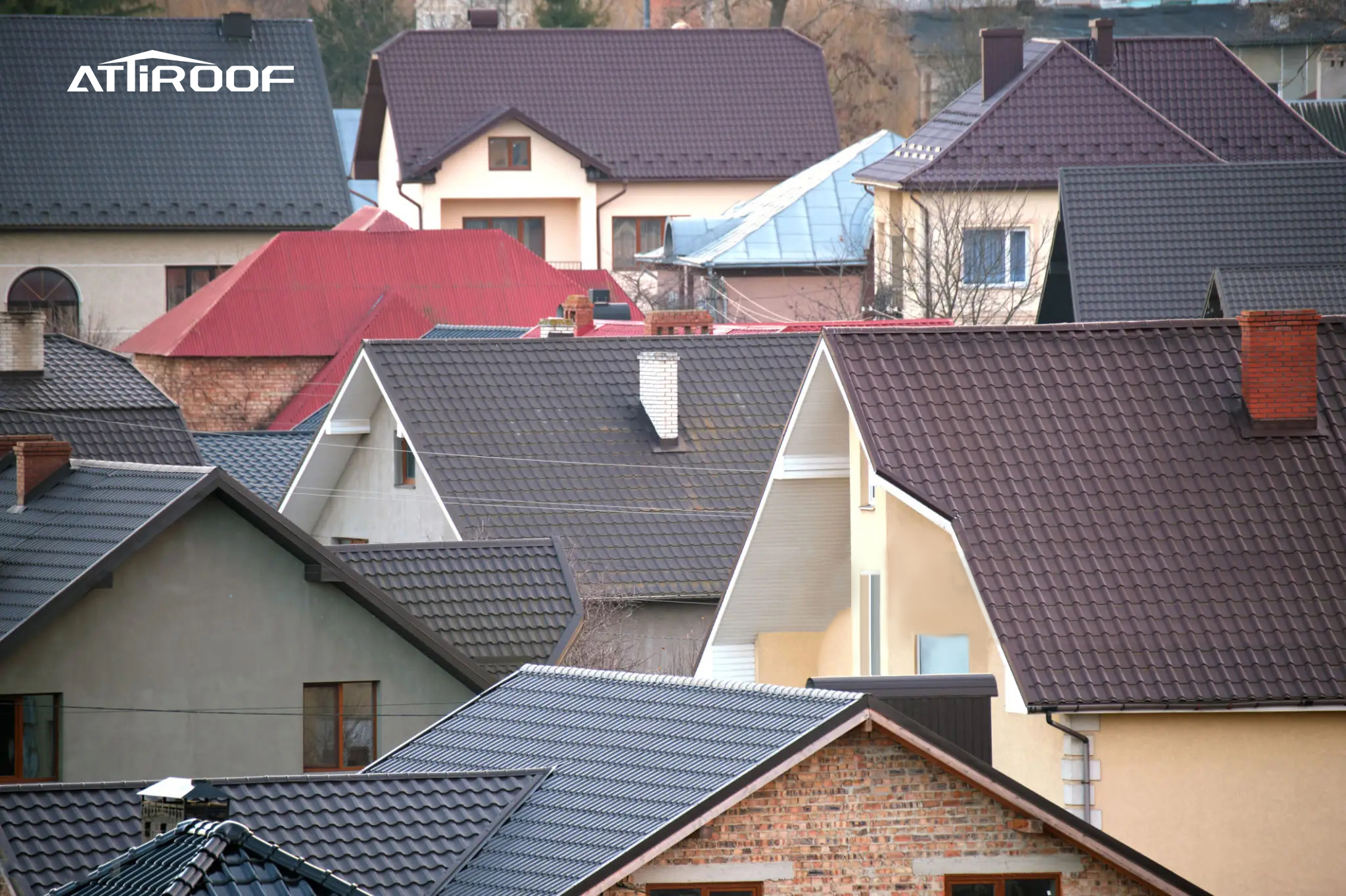 Diverse residential rooftops with different styles and colors, showcasing metal and tile roofing materials, with the attiroof logo visible.