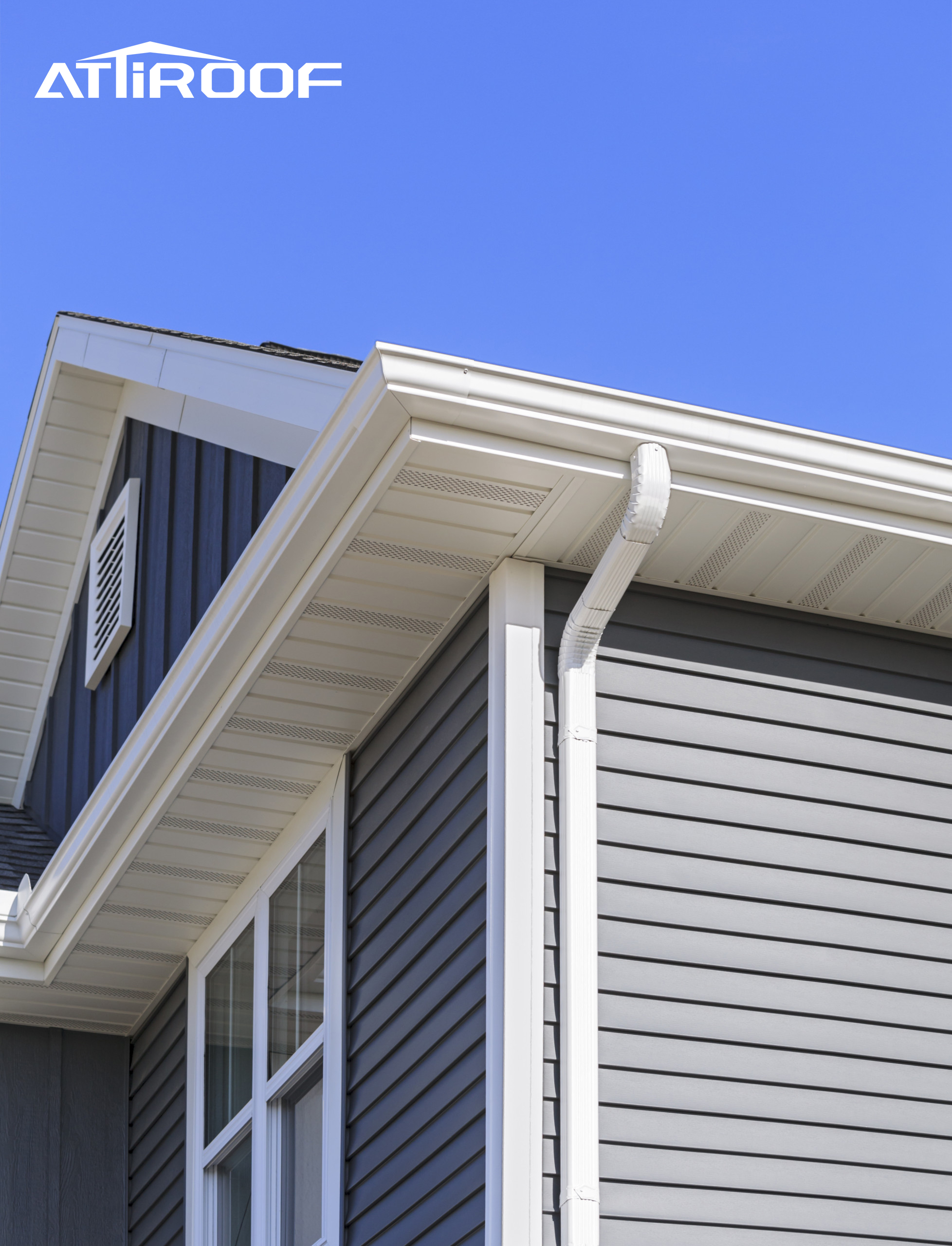 Well-maintained gutter system on a modern house.