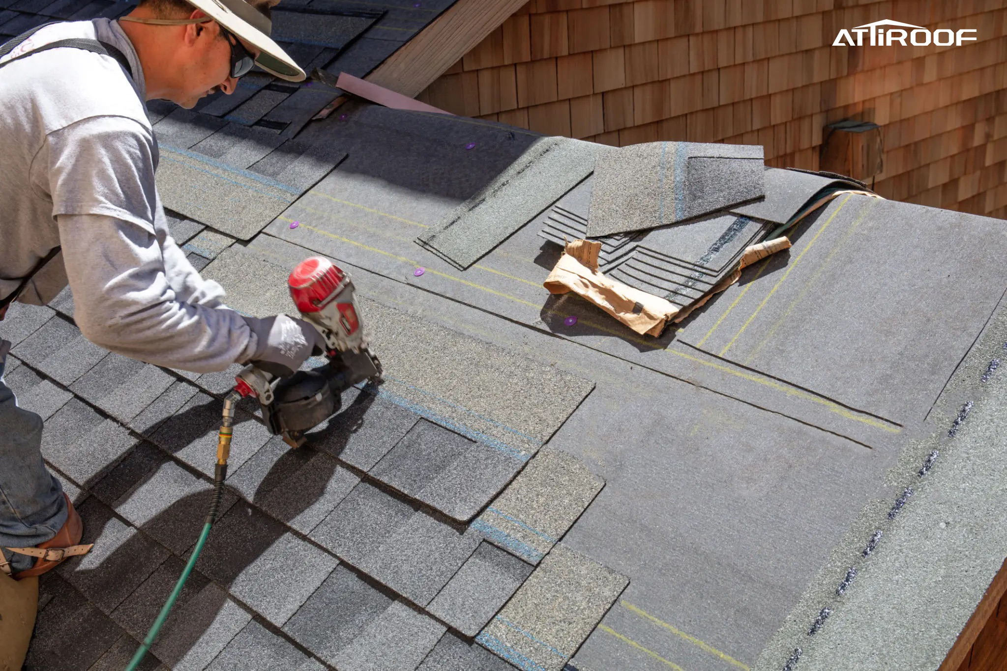 Professional installing Asphalt Shingles on a roof.