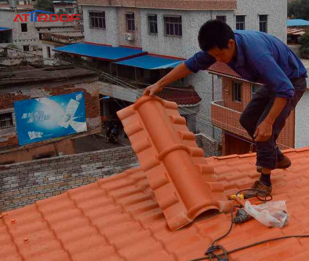 Construction workers are installing PVC tiles.